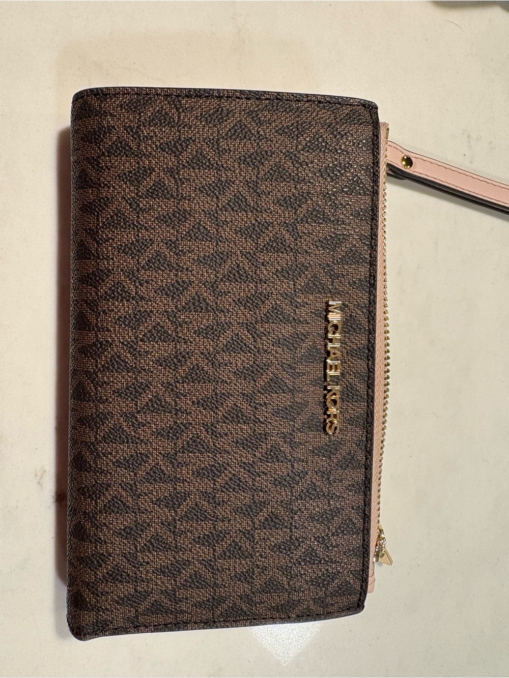 Michael Kors Brown Monogram Wristlet with Pink Trim
